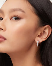 Livy Gold Huggie Earrings in White Crystal